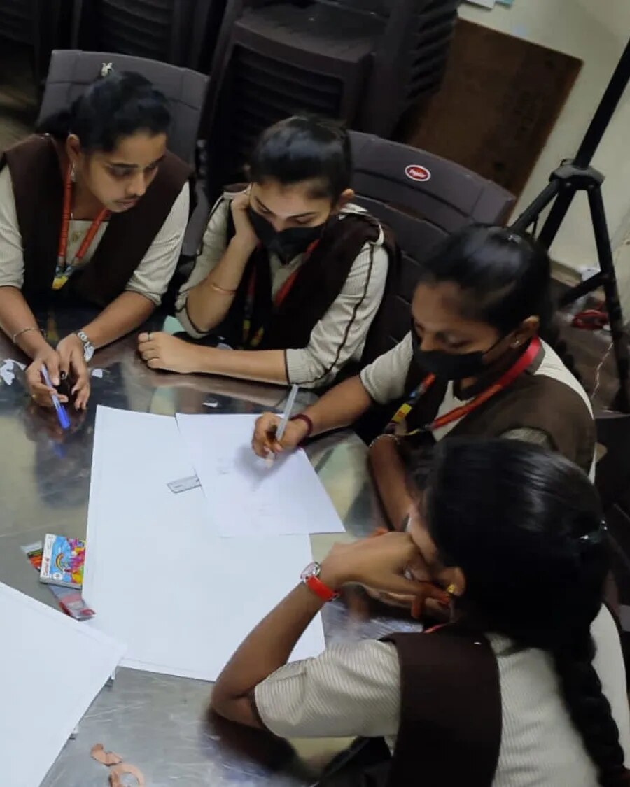 Students developing ideas during an E-Cell workshop