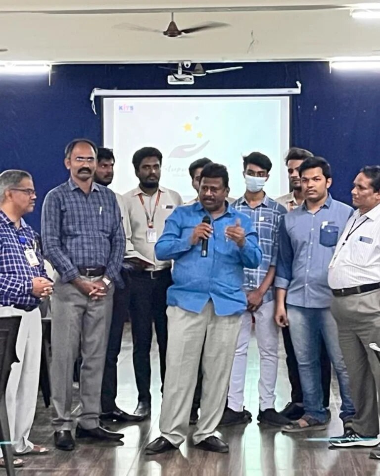 Faculty and students during an E-Cell presentation